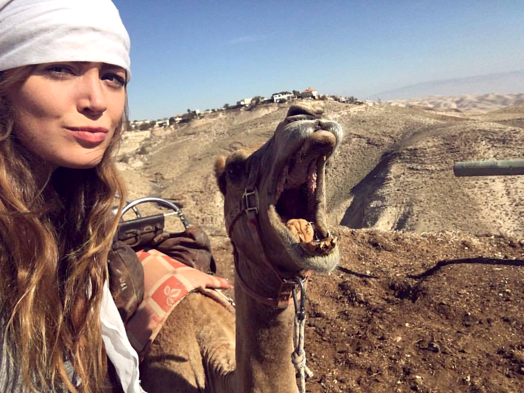 selfie with Olivia Balsinger and a smiling camel