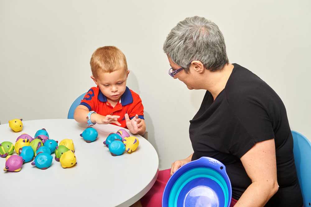 Marie Coppola tests children at the Bousfield Psychology Building