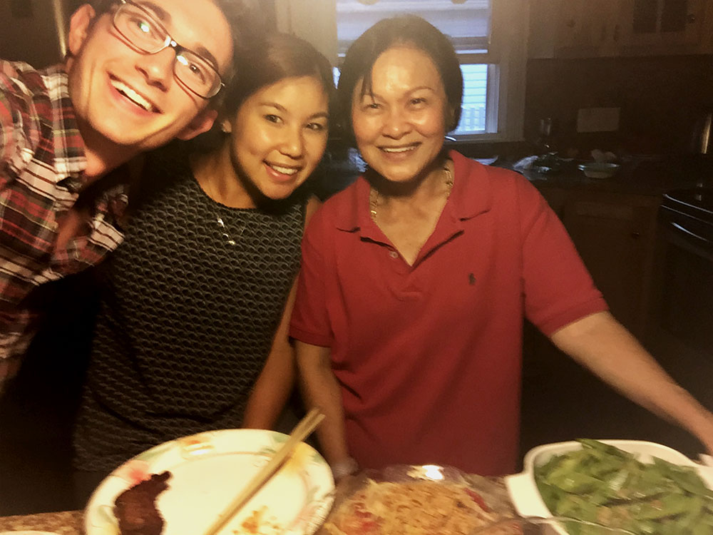 then pharmacy graduate students Connor Walker ’18 Pharm.D. and Celeste Cheung ’18 Pharm.D. with their patient, friend, and “Cambodian mom” Lila Plawecki.