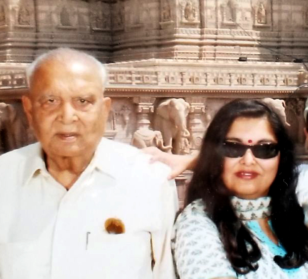 Her father Srinivas, Manisha, and her two sons, in New Delhi in 2010