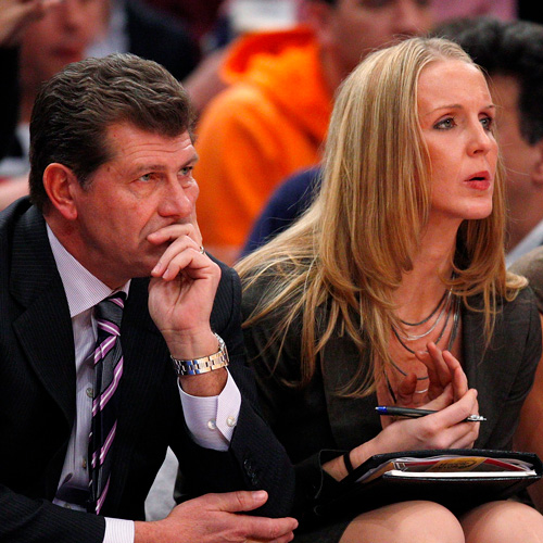 NEW YORK - DECEMBER 19: Geno Auriemma, head coach and assistant coaches Shea Ralph and Marisa Moseley of the Connecticut Huskies sit on the bench during the first half against the Ohio State Buckeyes in the Maggie Dixon Classic at Madison Square Garden on December 19, 2010 in New York City.