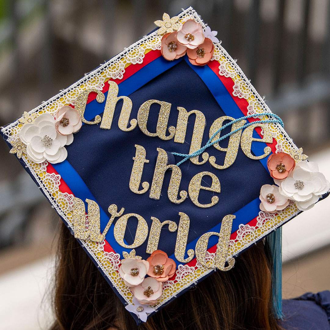 decorative grad cap with the words, Change the World
