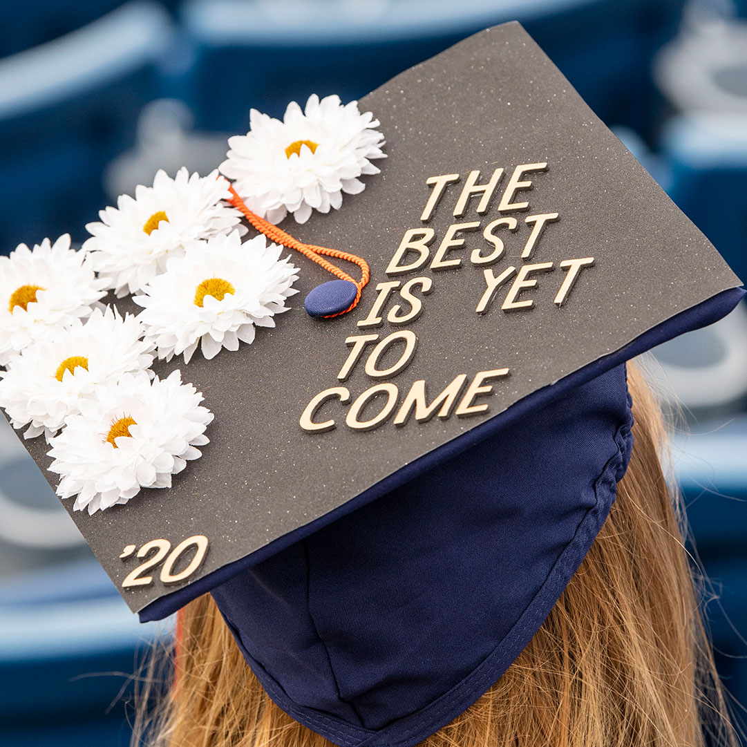 decorative grad cap with flowers and the words, The best is yet to come