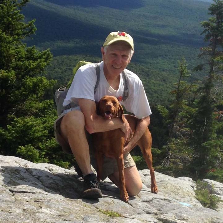Brohinsky hiking with his pup