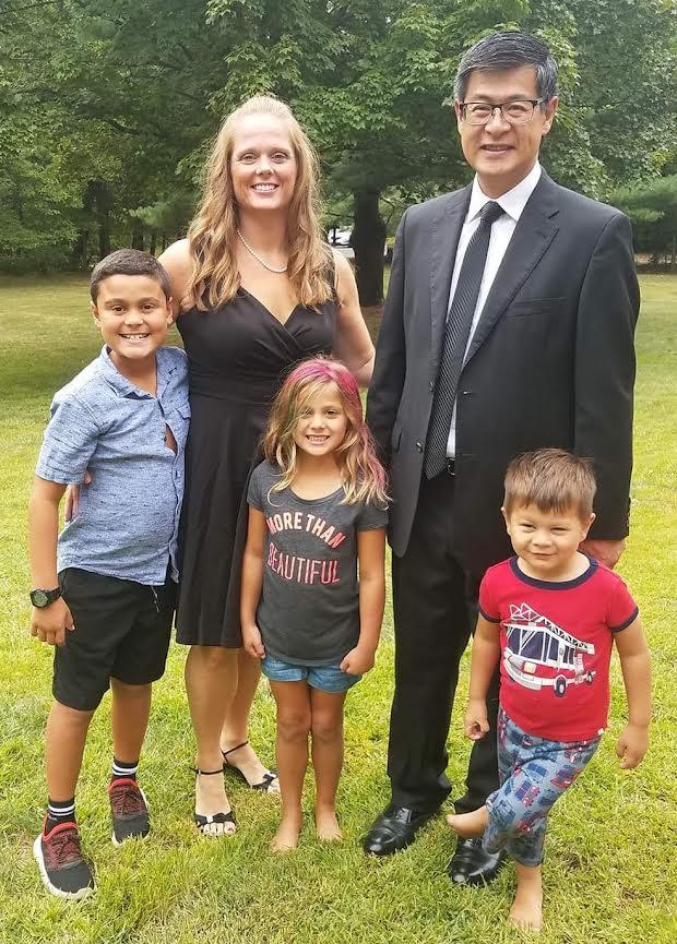 Jill Alsgaard and her husband, Trung Le, along with their children
