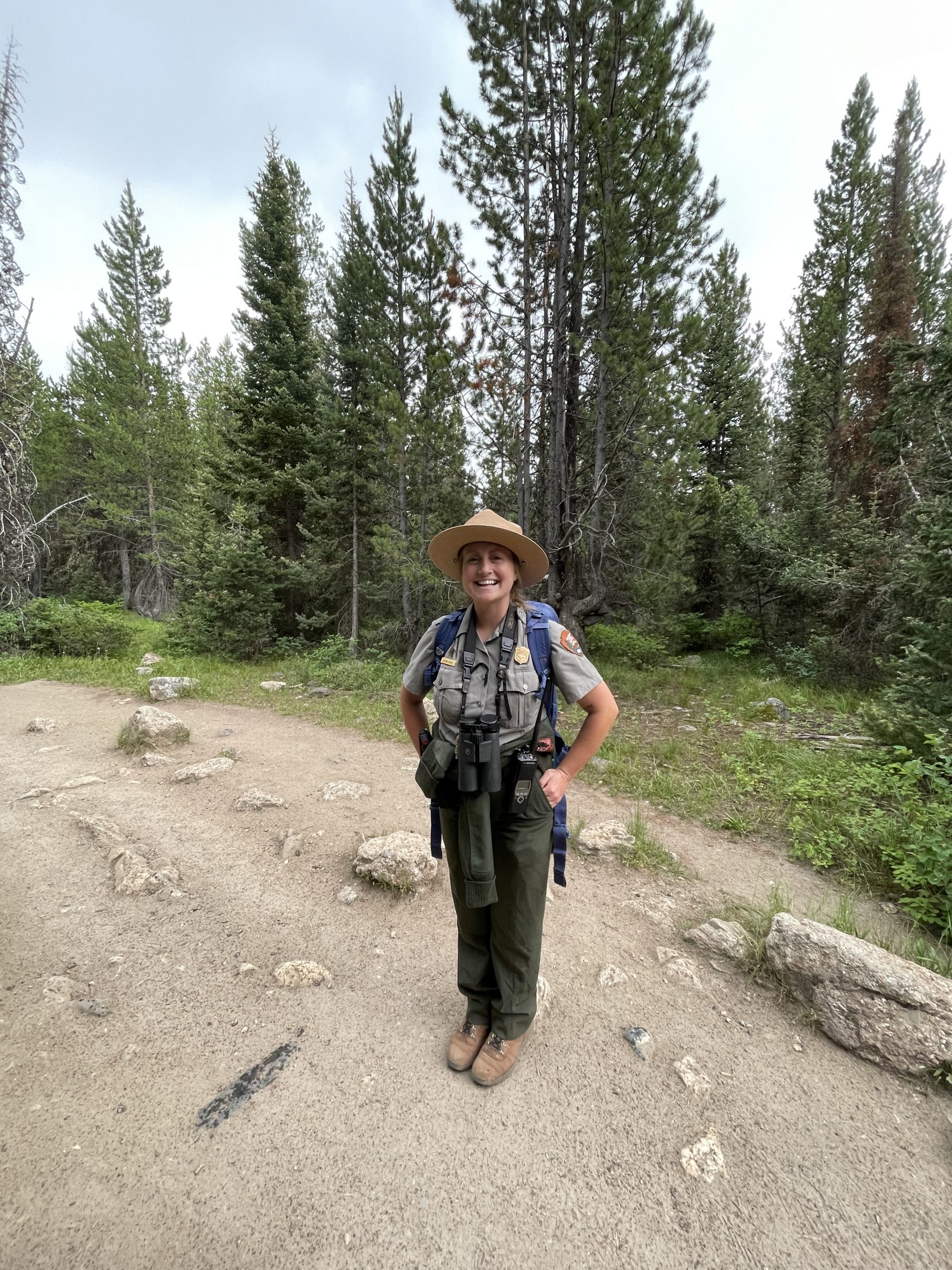 Woman smiling on trail