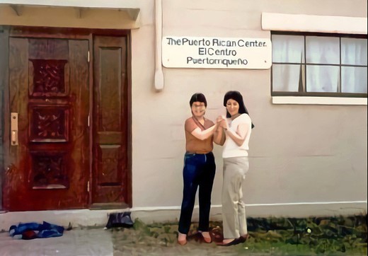Brunilda Gutierrez ’74 (CLAS) and Ana Isabel Lopez ’75 (CLAS) in front of the Puerto Rican Center in 1985.