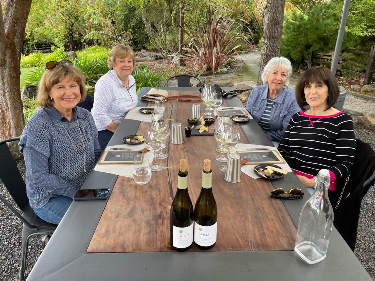 Clockwise from left, Mary (Piasecki) Speltz ’69 (BUS), Barbara (Barich) Wuchiski ’69 (HDFS), Alberta (Cianciulli) Hultman ’69 (ED), and Antoinette (Dantino) Carey ’69 (ED) at Arista Winery in Sonoma, California.