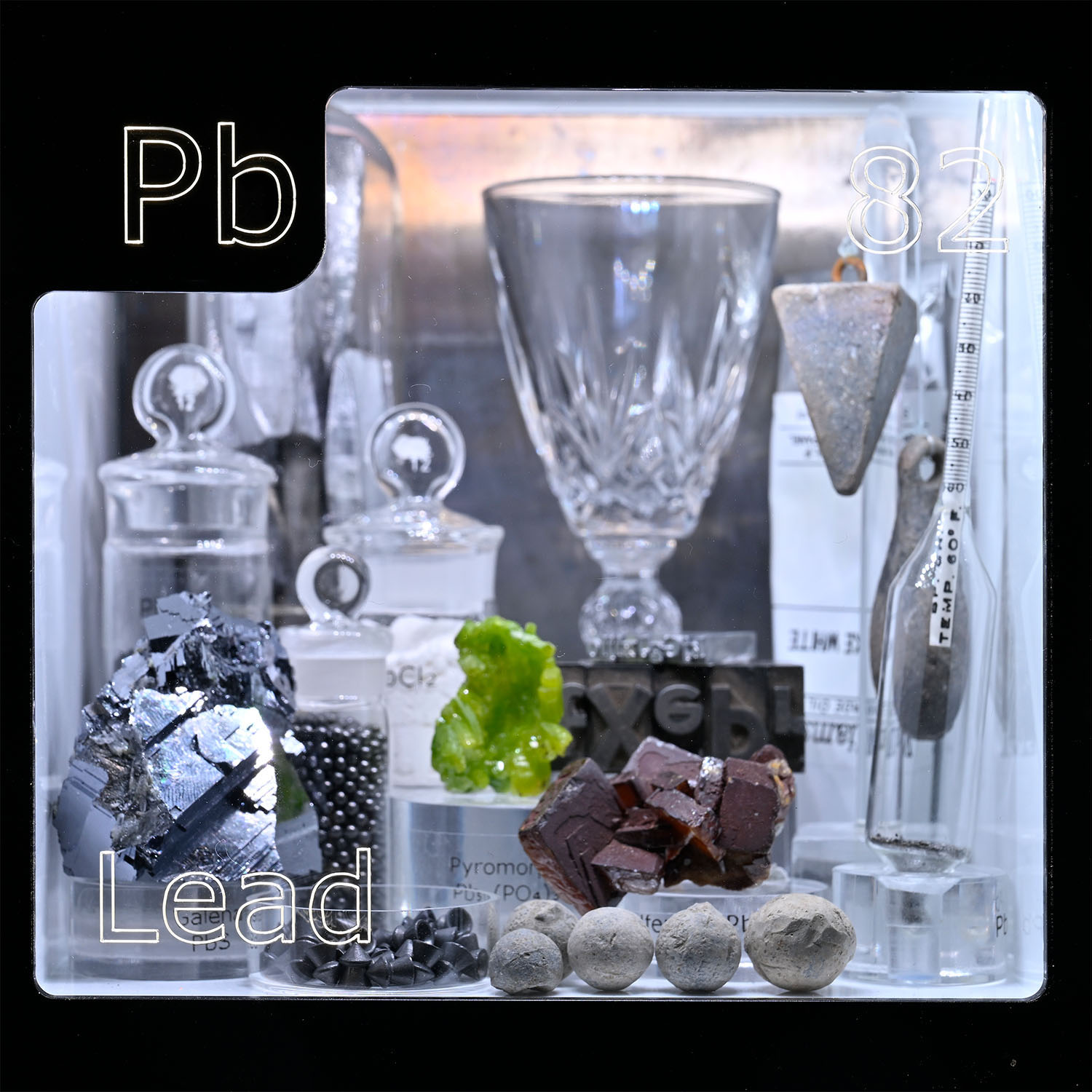Periodic Table Display - close up of Lead and the items that contain that element