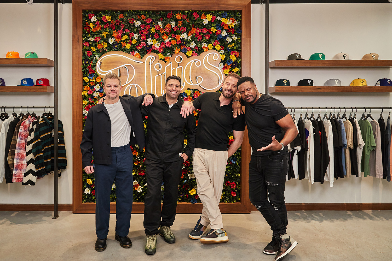Celebrities, KSI , Matt Damon, Ben Affleck, and Chris Tucker pose with Joe La Puma at his storefront