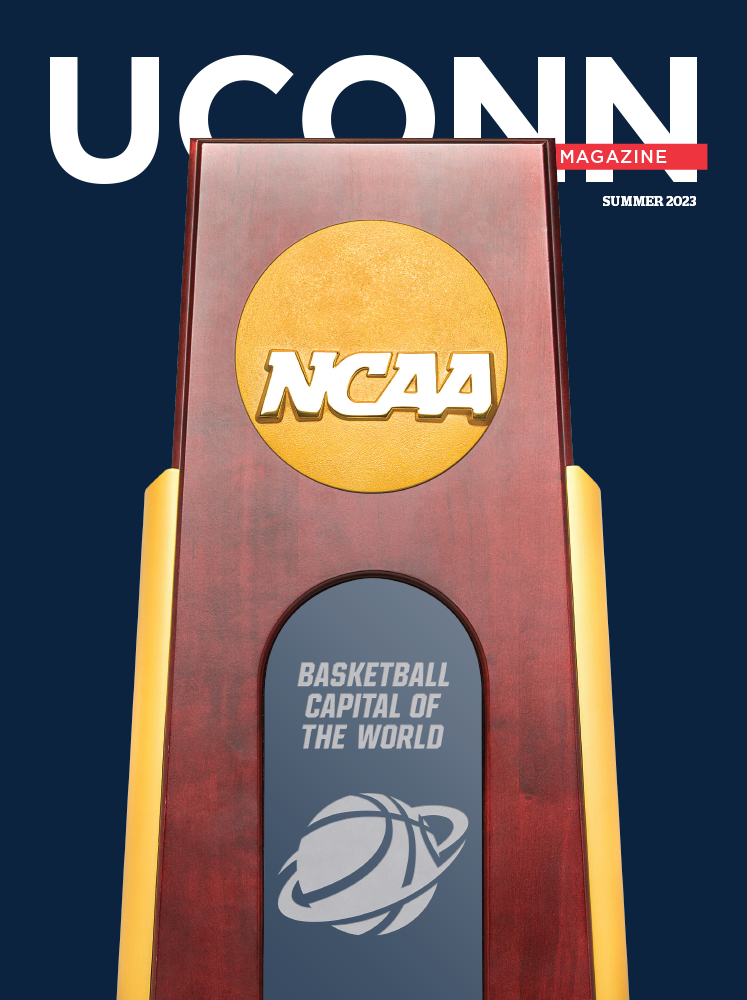 Cover of UConn Magazine featuring the 2023 NCAA Men's Basketball Championship trophy.