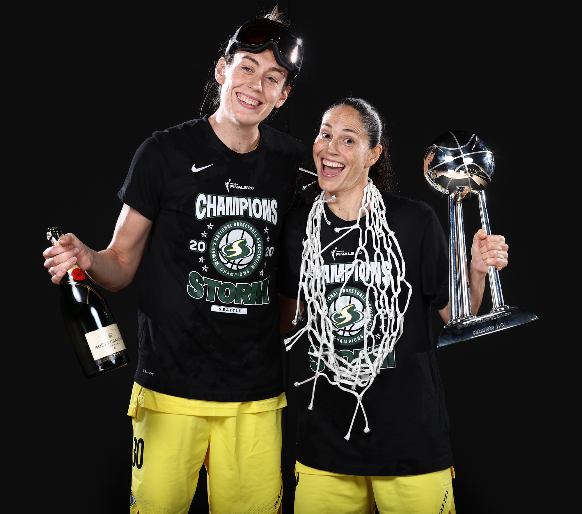 PALMETTO, FL - OCTOBER 6: Breanna Stewart #30 and Sue Bird #10 of the Seattle Storm poses for a portrait with the WNBA Championship Trophy after winning Game 3 of the 2020 WNBA Finals against the Las Vegas Aces on October 6, 2020 at Feld Entertainment Center in Palmetto, Florida.