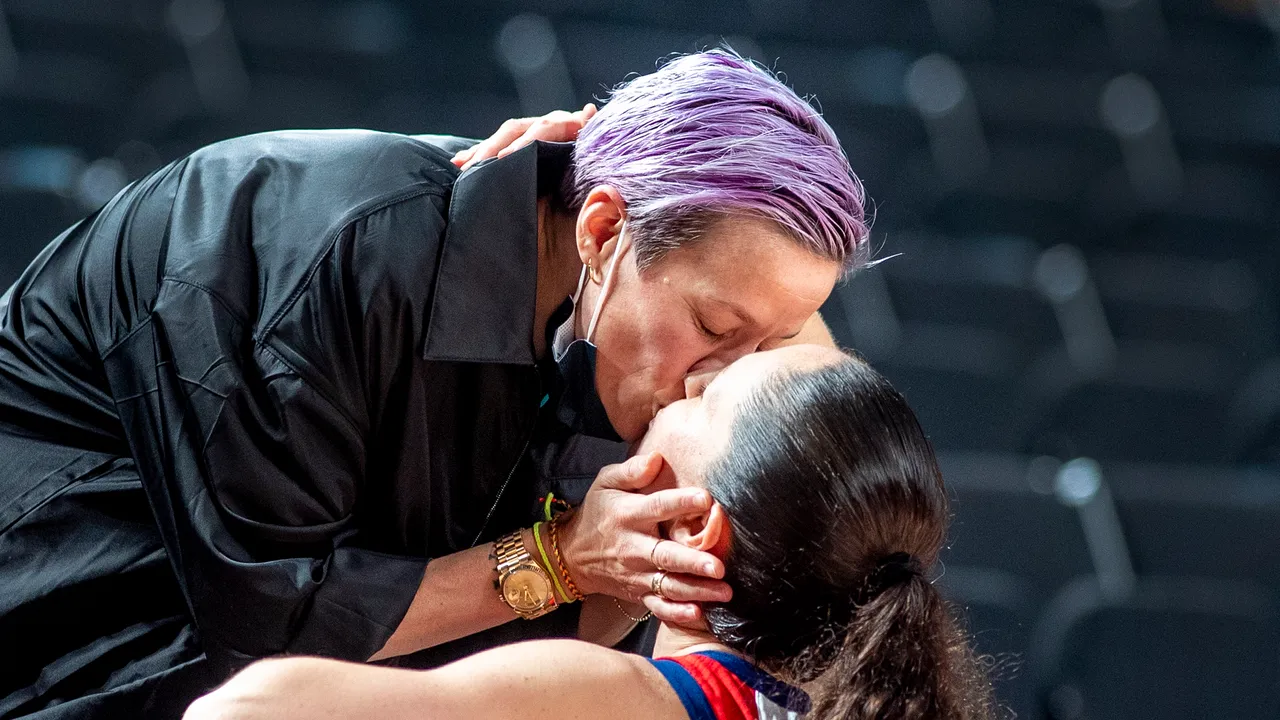 eam USA soccer gold medalist Megan Rapinoe kisses FIANCEE Bird after Bird’s fourth Team USA basketball gold