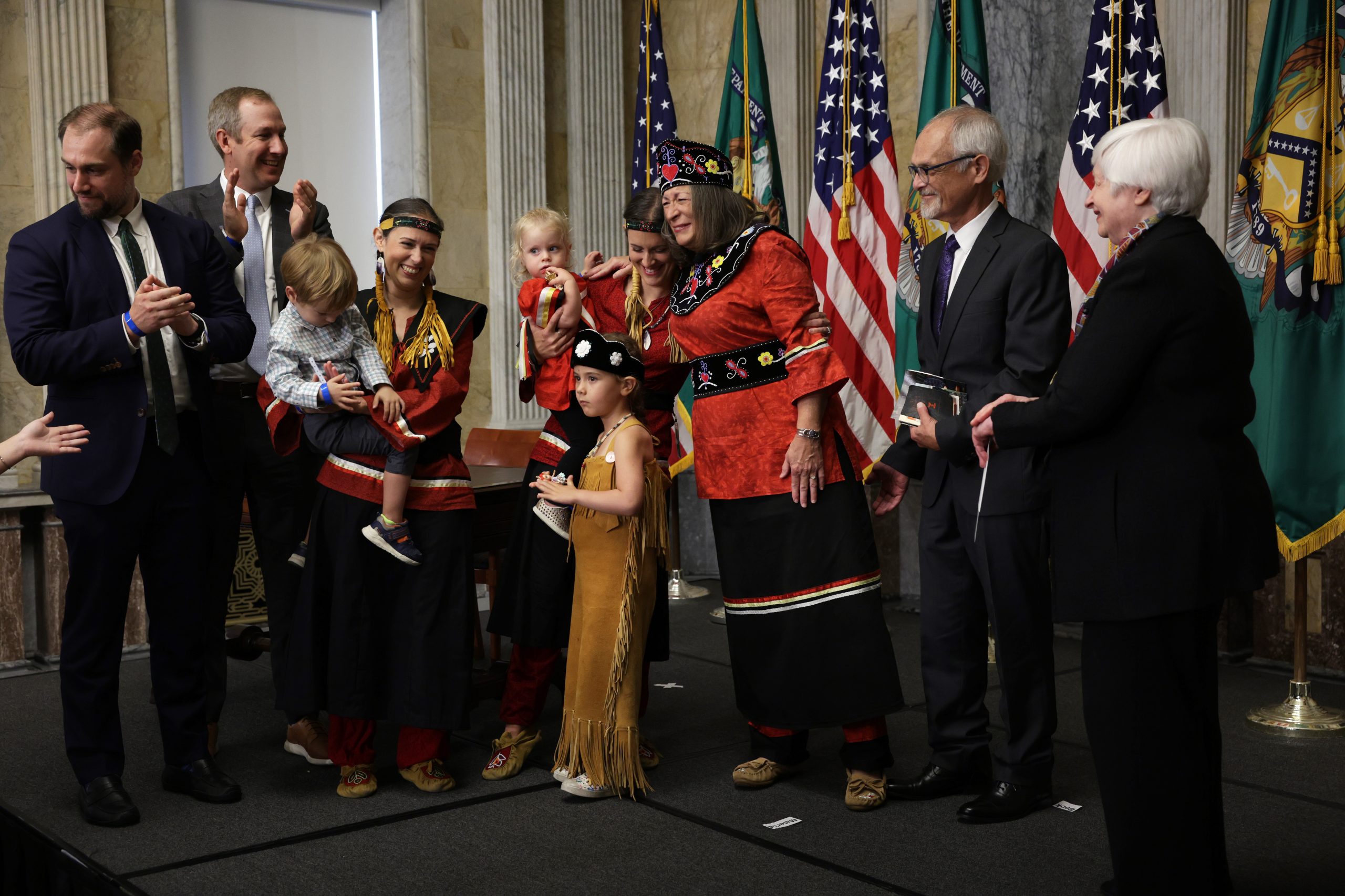 WASHINGTON, DC - SEPTEMBER 12: U.S. Treasurer and Mohegan Tribe Chief Lynn Malerba (C) shares a moment with a family member during a ceremonial swearing-in at the Cash Room of the Treasury Department September 12, 2022 in Washington, DC. Malerba is the first native American to become U.S. treasurer.