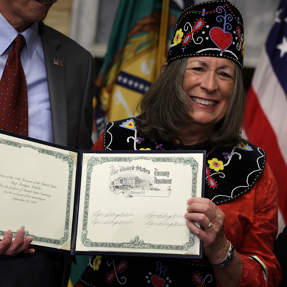 U.S. Treasurer and Mohegan Tribe Chief Lynn Malerba shows her signature for the purpose of United States currency during a ceremonial swearing-in for Malerba at the Cash Room of the Treasury Department September 12, 2022 in Washington, DC. Malerba is the first native American to become U.S. treasurer.