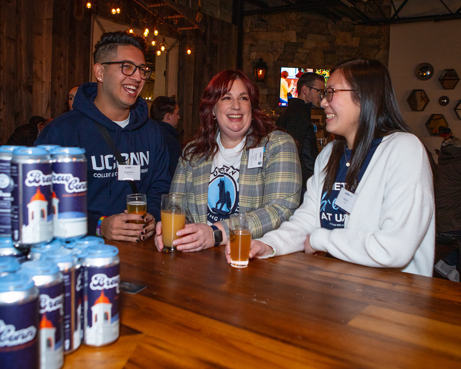 Jordan Aeschlimann, Riquelmy Torres, and Hailey Tam at the 1881 series foundation brewery event.