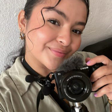 Kimberly Rosado poses with her Sony camera