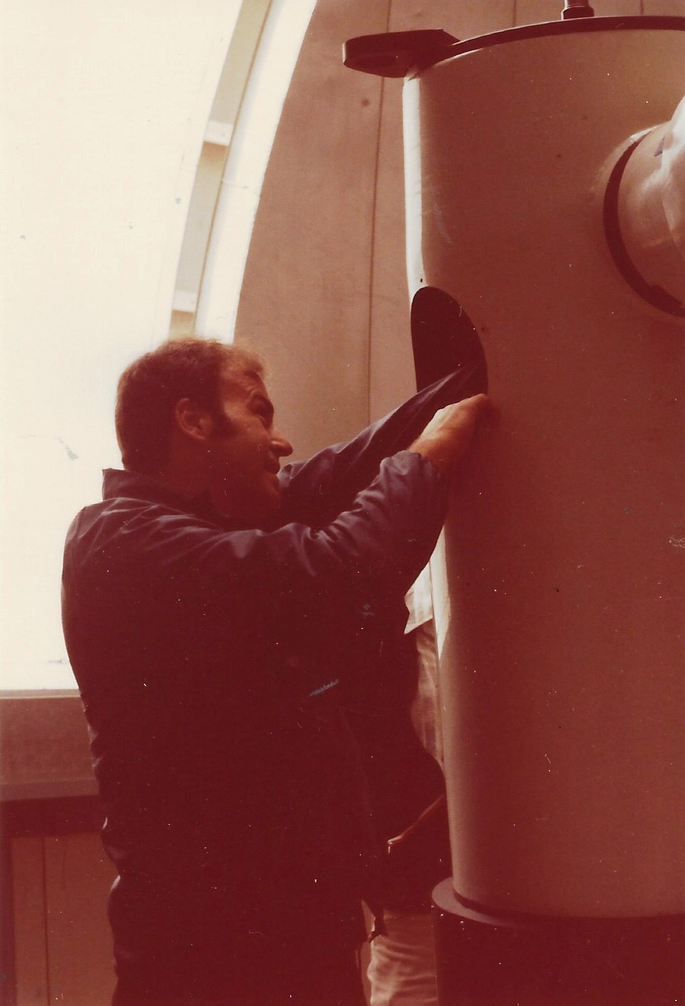 archival image of Dick Mindek working inside the East Road Observatory