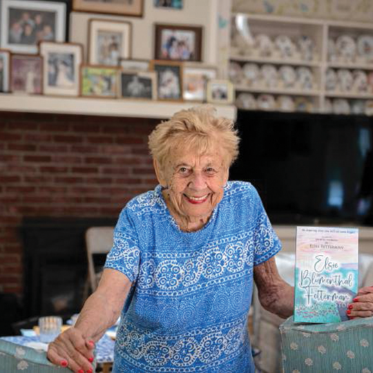 Elsie Fetterman holds her book