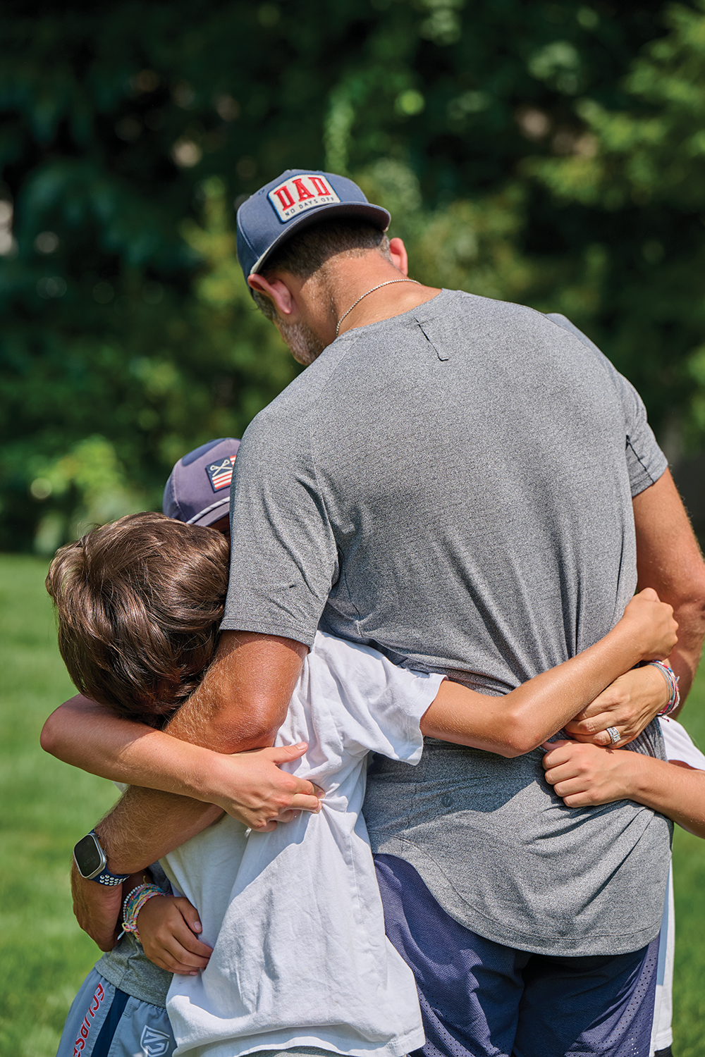 Orlovsky and his kids hug eachother