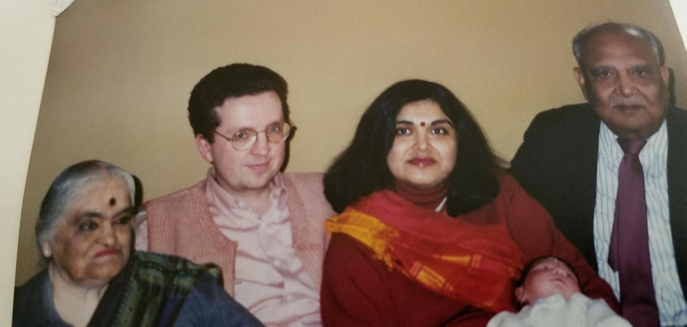 Manisha's husband, Manisha, their first son, and her father Srinivas