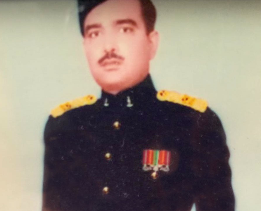 Manisha's father in his younger years dressed in military garb