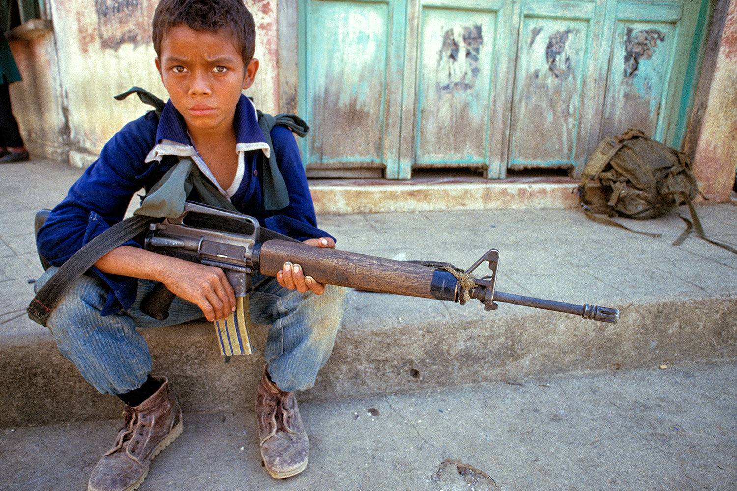 Adolescent guerrilla in UsulutÃ¡n Province, El Salvador, 1989.