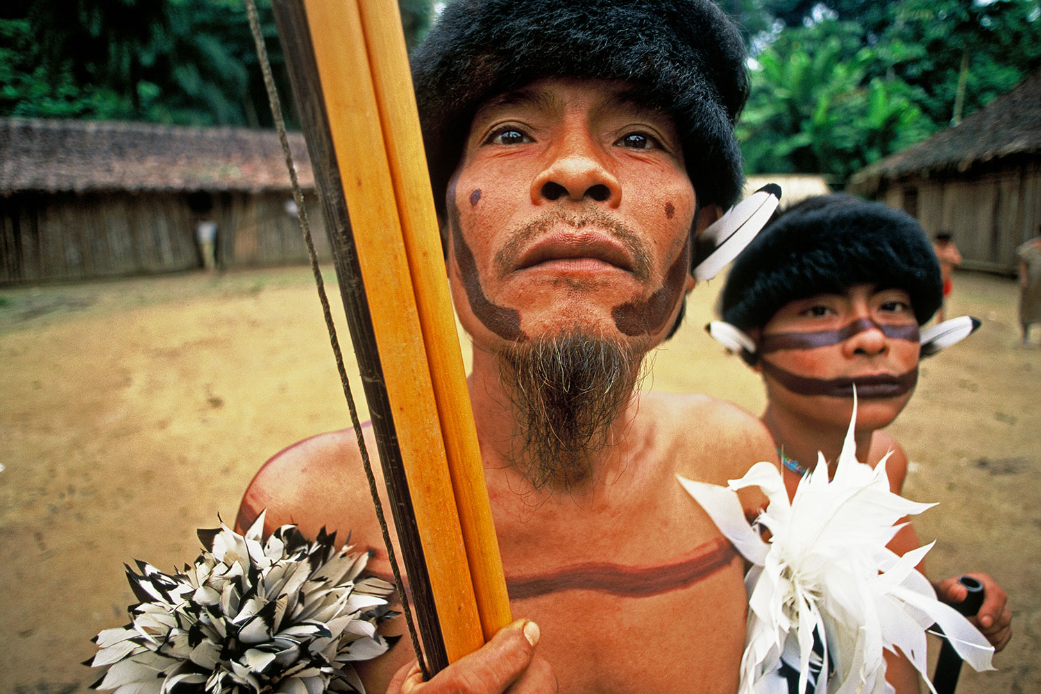 Yanomami father and son in the Orinoco River Valley, Venezuela, 2001.