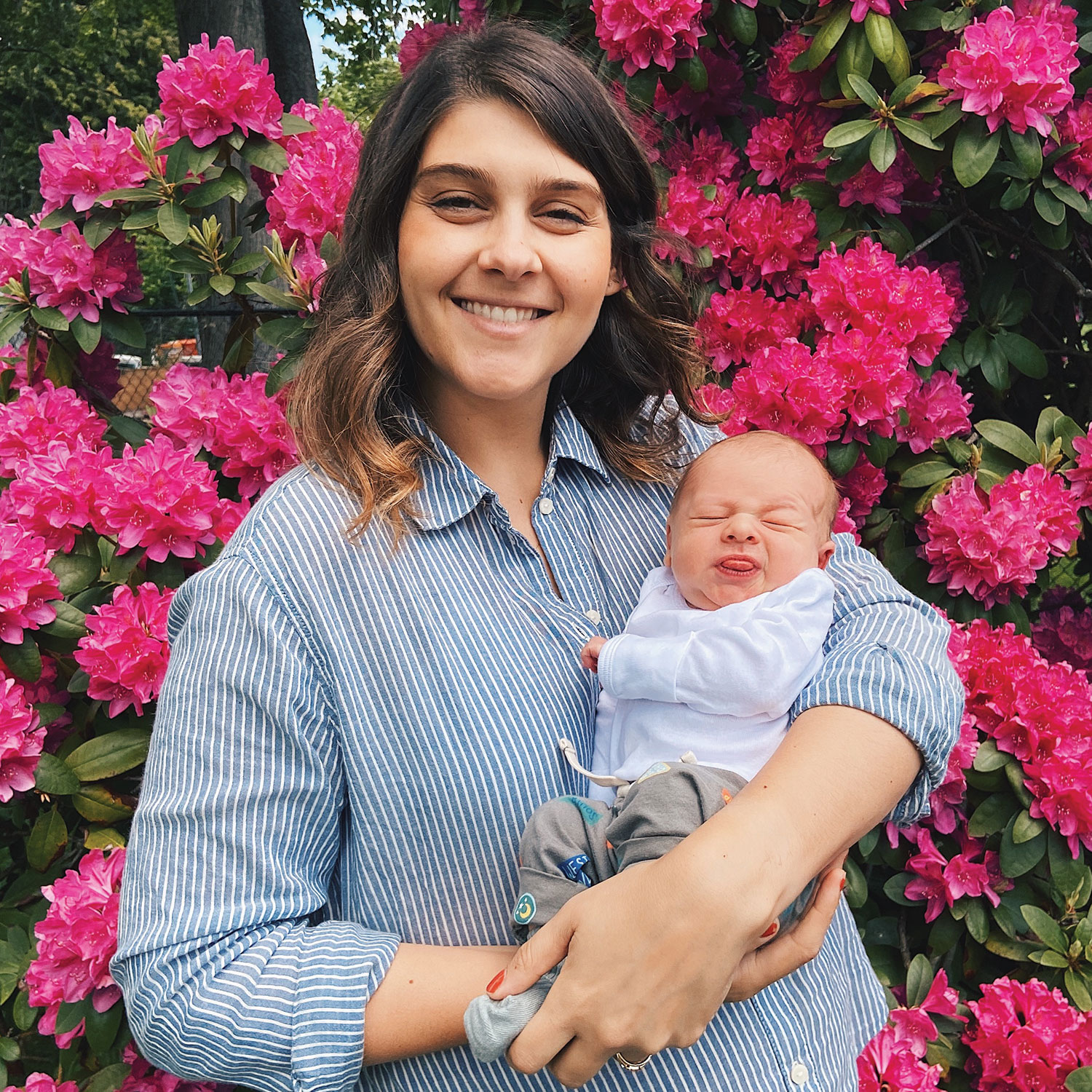 Christa Yung holding first child, Eugene Oliver