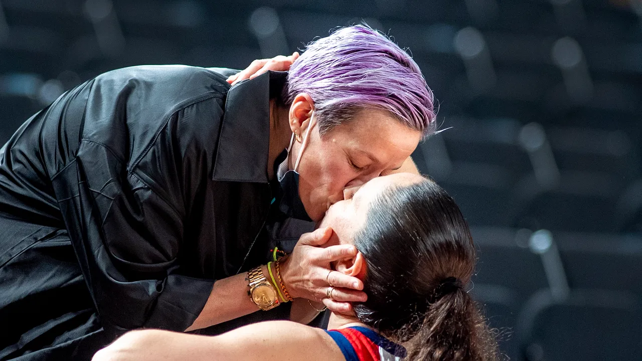 eam USA soccer gold medalist Megan Rapinoe kisses FIANCEE Bird after Bird's fourth Team USA basketball gold