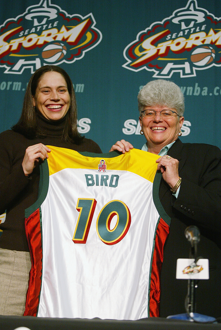 SEATTLE - APRIL 27: First overall pick of the 2002 WNBA draft Sue Bird #10 of the Seattle Storm poses with head coach Lynn Dunn before game 3 of the Western Conference quarterfinals between the Seattle SuperSonics and the San Antonio Spurs at Key Arena in Seattle, Washington on April 27, 2002. The Spurs won 102-75. 