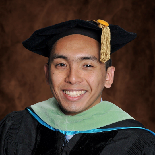 Ryan Verano in cap and gown