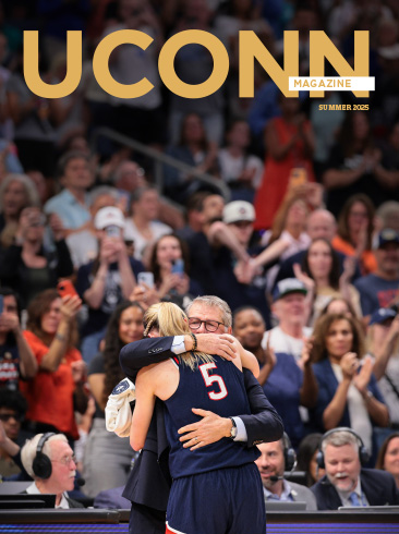 Cover of UConn Magazine Summer 2025 Issue featuring pivotable moment where Coach Geno Auriemma embraces Paige Bueckers during championship game