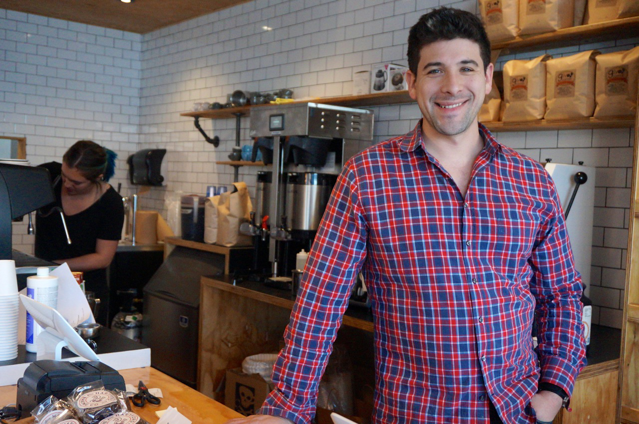 ScottKluger Scott Kluger smiles behind the counter at one of his Hartford Baking Company stores