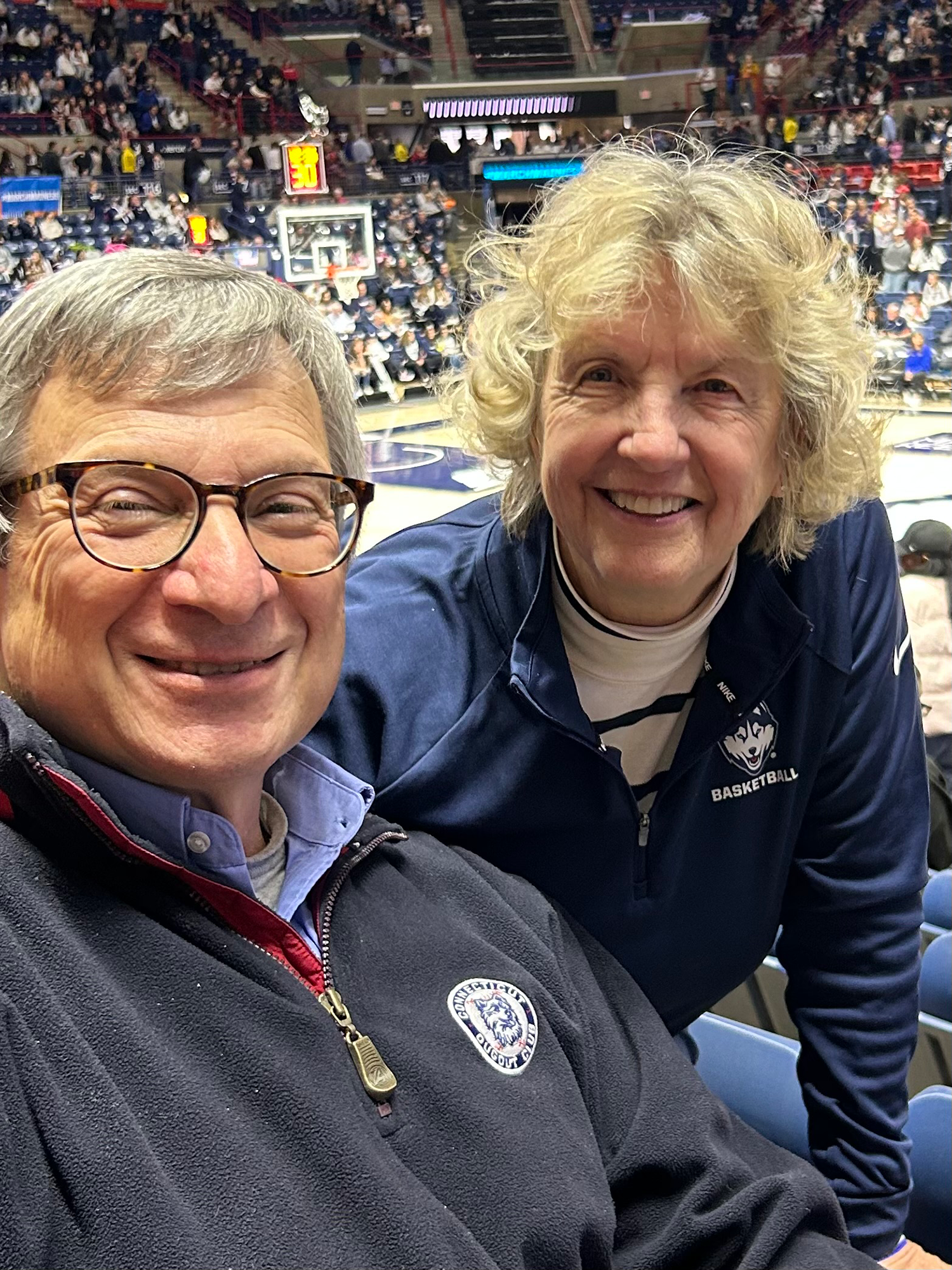 Peter and Judy Scarafile in the stands at Gampel Pavilion
