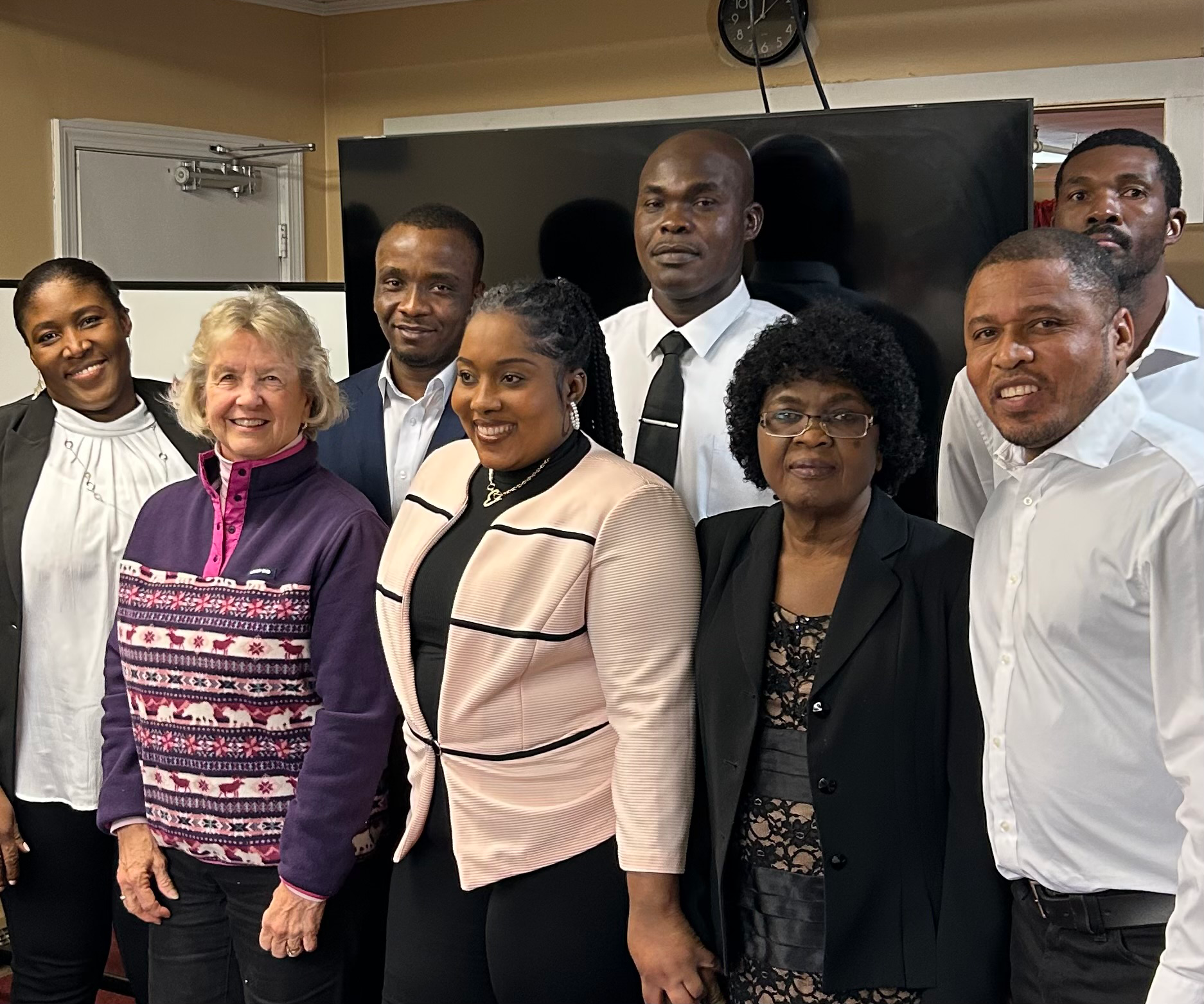 Judy Scarafile with a group of people from the Haitian community awarding her for her volunteer efforts in Haiti after earthquakes
