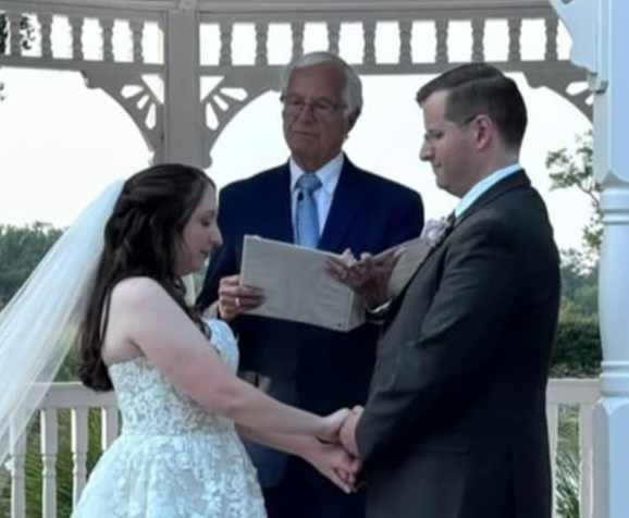 James and wife exchange vows on their wedding day.