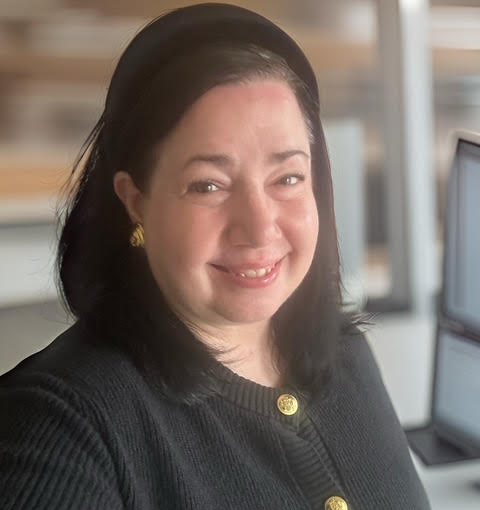 A portrait photo of Jennifer Tomasello.