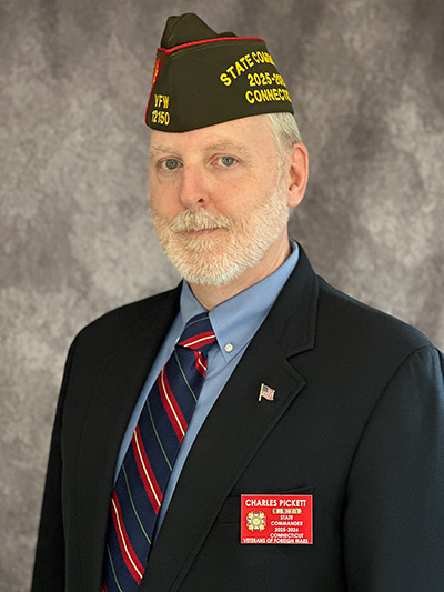 Charles M poses for a professional portrait, in uniform.