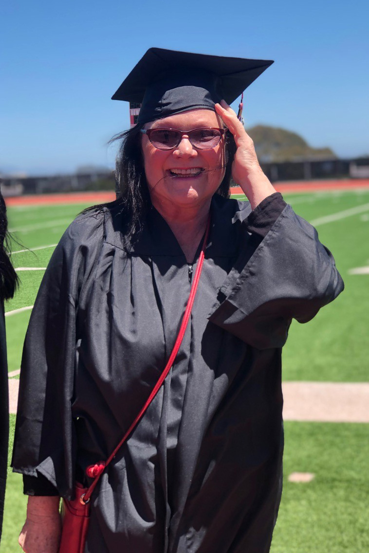 Elizabeth in cap and gown.