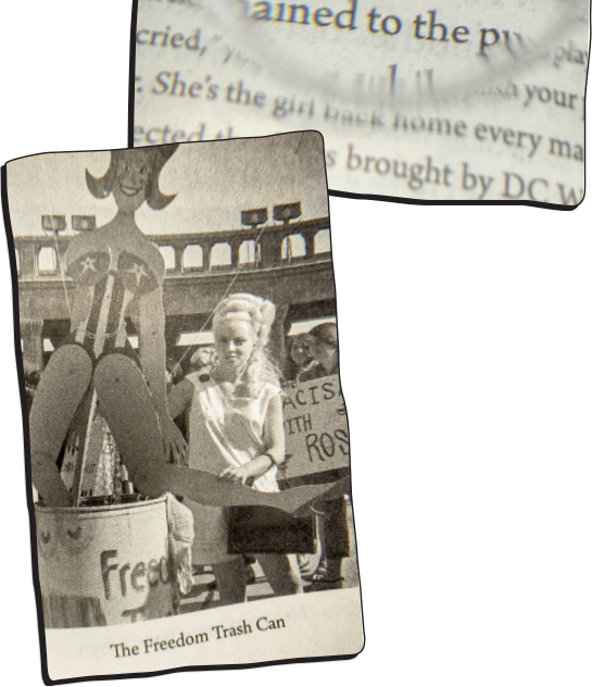A black-and-white photo featuring a Wonder Woman-looking cutout over a trashcan labeled "Freedom Trash"