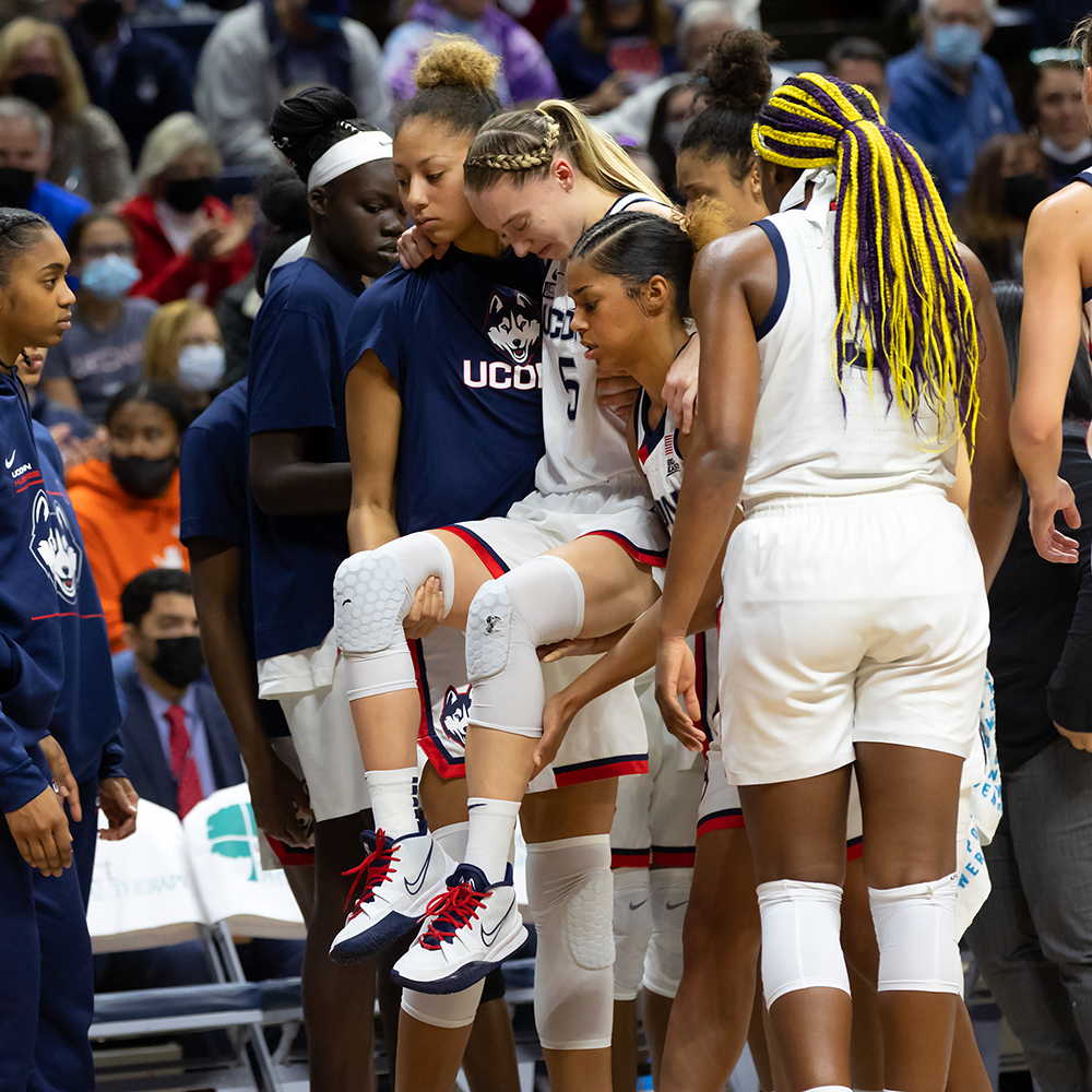 Bueckers, in 2021-22 game against Notre Dame is injured and is carried off court.